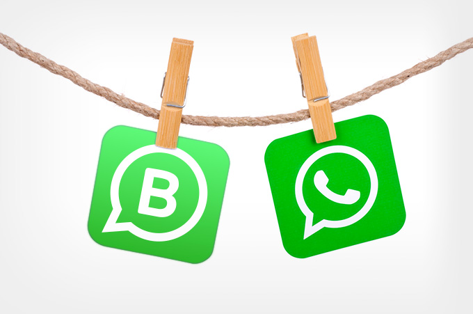 Íconos de WhatsApp y WhatsApp Business Colgando de Tendedero